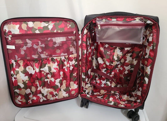 Samantha Brown 22" Upright Spinner Luggage